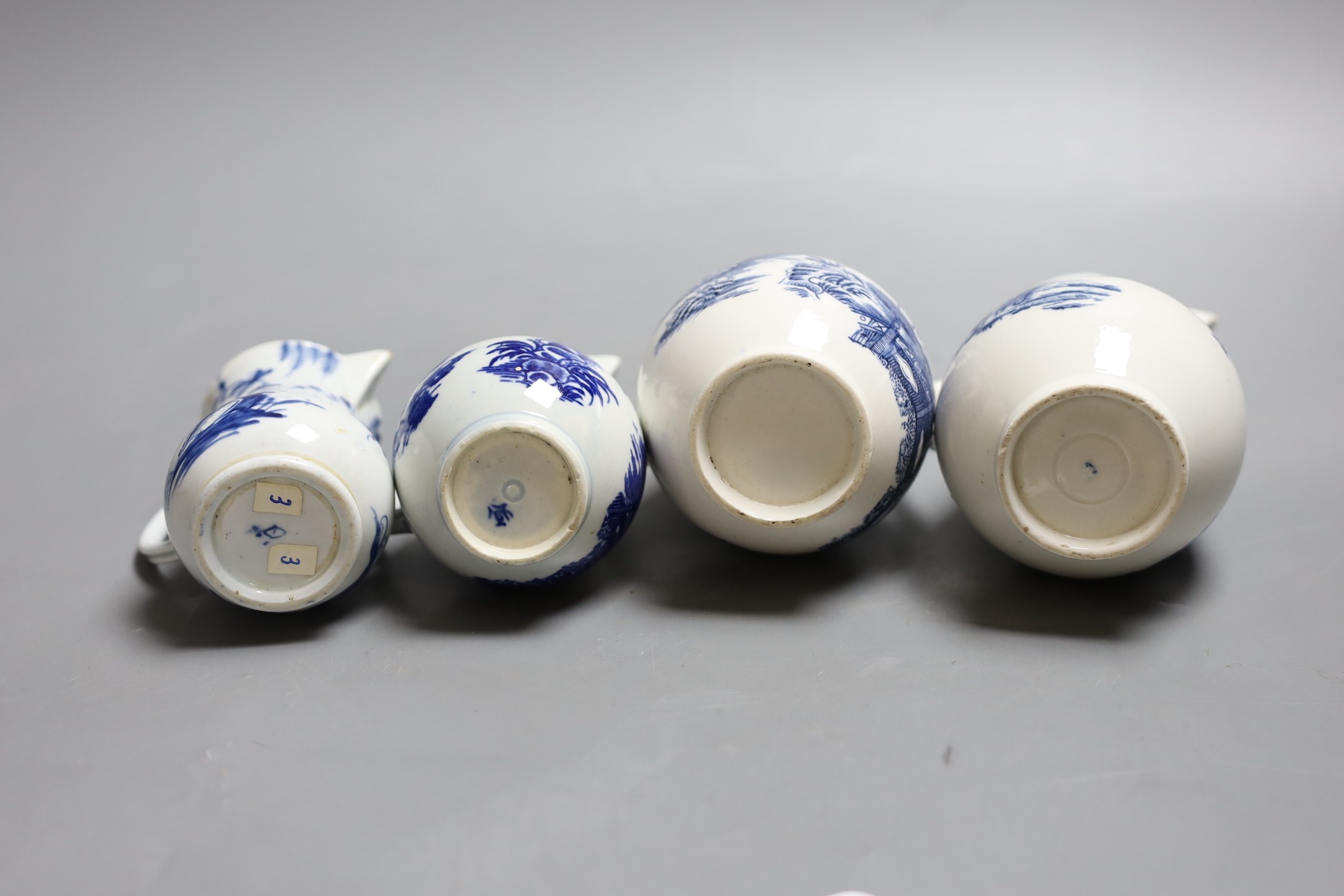 Four late 18th century Worcester blue and white sparrow beak jugs, tallest 12cm